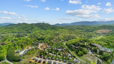 Here is an amazing opportunity to get your 2-bedroom, 2-bathroom on Gatlinburg Golf Course in Tennessee - for sale on GolfHomes.com, golf home, golf lot