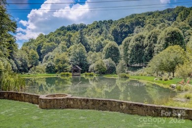 Perched at the pinnacle of the 5,300-acre gated Wolf Laurel on Wolf Laurel Country Club in North Carolina - for sale on GolfHomes.com, golf home, golf lot