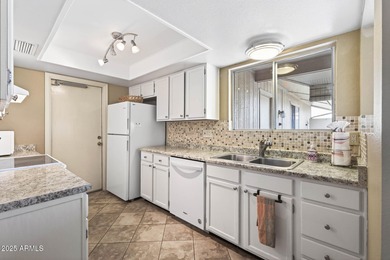 Fully furnished this unit offers easy, low-maintenance living on Deer Valley Golf Course in Arizona - for sale on GolfHomes.com, golf home, golf lot