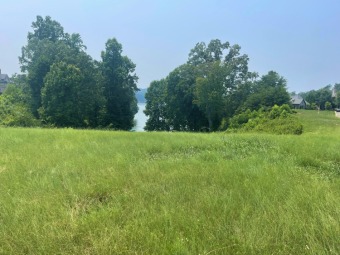 Gorgeous homesite nestled on a nice cove just off the main on Wind River Golf Course in Tennessee - for sale on GolfHomes.com, golf home, golf lot