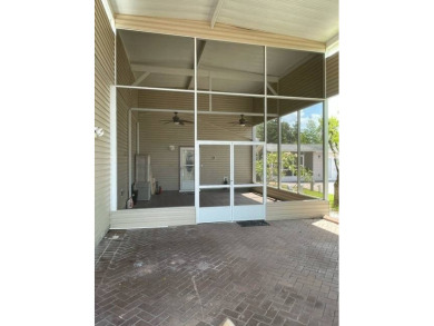 Nestled on a somewhat private lot in the 55+ Class A gated RV on Deer Creek RV Golf Resort in Florida - for sale on GolfHomes.com, golf home, golf lot