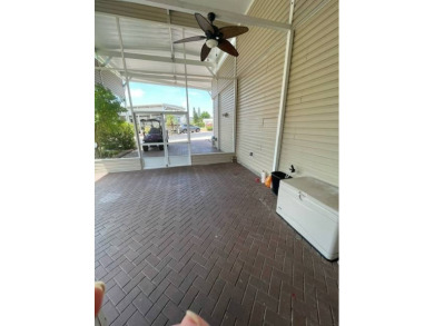 Nestled on a somewhat private lot in the 55+ Class A gated RV on Deer Creek RV Golf Resort in Florida - for sale on GolfHomes.com, golf home, golf lot