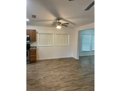 Nestled on a somewhat private lot in the 55+ Class A gated RV on Deer Creek RV Golf Resort in Florida - for sale on GolfHomes.com, golf home, golf lot