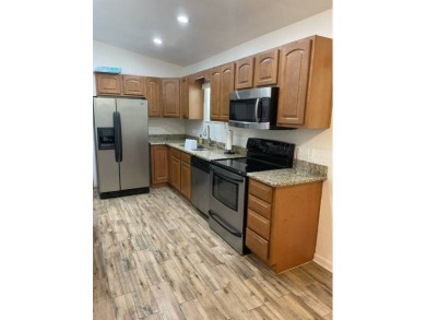 Nestled on a somewhat private lot in the 55+ Class A gated RV on Deer Creek RV Golf Resort in Florida - for sale on GolfHomes.com, golf home, golf lot