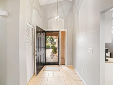 One or more photo(s) has been virtually staged. Step into this on Sandpiper Golf Club in Florida - for sale on GolfHomes.com, golf home, golf lot