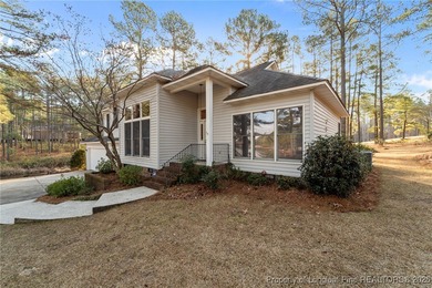 Experience modern living in this contemporary split-level home on Deercroft Golf and Country Club in North Carolina - for sale on GolfHomes.com, golf home, golf lot