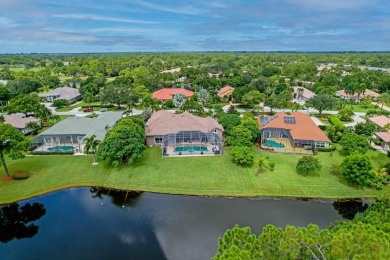 STUNNING, CUSTOM DESIGNED RESIDENCE, PERFECTLY SITUATED ON A 1/2 on The Legacy Golf and Tennis Club in Florida - for sale on GolfHomes.com, golf home, golf lot