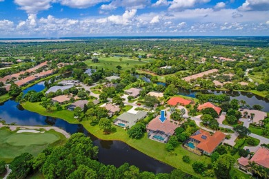 STUNNING, CUSTOM DESIGNED RESIDENCE, PERFECTLY SITUATED ON A 1/2 on The Legacy Golf and Tennis Club in Florida - for sale on GolfHomes.com, golf home, golf lot