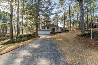 Experience modern living in this contemporary split-level home on Deercroft Golf and Country Club in North Carolina - for sale on GolfHomes.com, golf home, golf lot