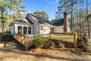 Experience modern living in this contemporary split-level home on Deercroft Golf and Country Club in North Carolina - for sale on GolfHomes.com, golf home, golf lot