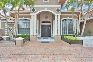 STUNNING, CUSTOM DESIGNED RESIDENCE, PERFECTLY SITUATED ON A 1/2 on The Legacy Golf and Tennis Club in Florida - for sale on GolfHomes.com, golf home, golf lot