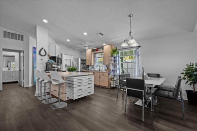 Move-in ready! Beautifully upgraded home with 2 bedrooms, 2 bath on The Golf Club of Jupiter in Florida - for sale on GolfHomes.com, golf home, golf lot