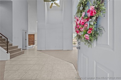 Experience modern living in this contemporary split-level home on Deercroft Golf and Country Club in North Carolina - for sale on GolfHomes.com, golf home, golf lot