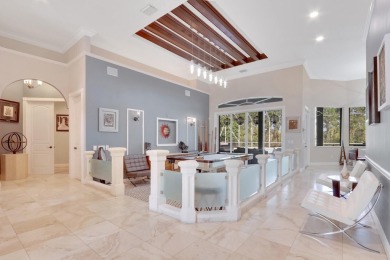 STUNNING, CUSTOM DESIGNED RESIDENCE, PERFECTLY SITUATED ON A 1/2 on The Legacy Golf and Tennis Club in Florida - for sale on GolfHomes.com, golf home, golf lot