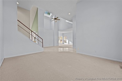 Experience modern living in this contemporary split-level home on Deercroft Golf and Country Club in North Carolina - for sale on GolfHomes.com, golf home, golf lot