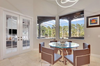 STUNNING, CUSTOM DESIGNED RESIDENCE, PERFECTLY SITUATED ON A 1/2 on The Legacy Golf and Tennis Club in Florida - for sale on GolfHomes.com, golf home, golf lot