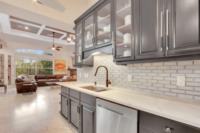 STUNNING, CUSTOM DESIGNED RESIDENCE, PERFECTLY SITUATED ON A 1/2 on The Legacy Golf and Tennis Club in Florida - for sale on GolfHomes.com, golf home, golf lot