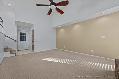 Experience modern living in this contemporary split-level home on Deercroft Golf and Country Club in North Carolina - for sale on GolfHomes.com, golf home, golf lot