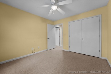 Experience modern living in this contemporary split-level home on Deercroft Golf and Country Club in North Carolina - for sale on GolfHomes.com, golf home, golf lot