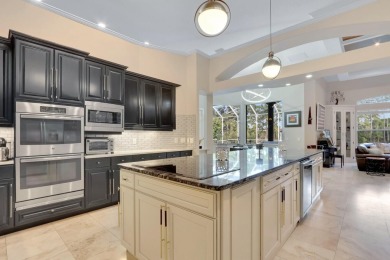 STUNNING, CUSTOM DESIGNED RESIDENCE, PERFECTLY SITUATED ON A 1/2 on The Legacy Golf and Tennis Club in Florida - for sale on GolfHomes.com, golf home, golf lot