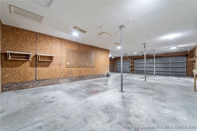 Experience modern living in this contemporary split-level home on Deercroft Golf and Country Club in North Carolina - for sale on GolfHomes.com, golf home, golf lot