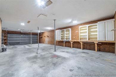 Experience modern living in this contemporary split-level home on Deercroft Golf and Country Club in North Carolina - for sale on GolfHomes.com, golf home, golf lot