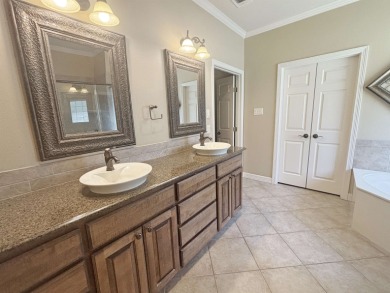 Beautifully maintained 4-bedroom, 4-bathroom home situated on a on Elkins Lake Golf Course in Texas - for sale on GolfHomes.com, golf home, golf lot