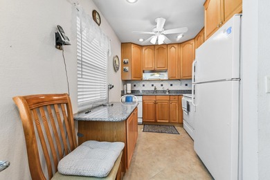 Enjoy easy living in this well-priced 2-bedroom, 2-bath condo in on Kings Point Golf -Flanders Way in Florida - for sale on GolfHomes.com, golf home, golf lot