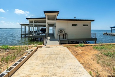 Introducing a RARE opportunity for luxury lakefront living and on Eagles Bluff Golf Course in Texas - for sale on GolfHomes.com, golf home, golf lot