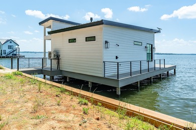 Introducing a RARE opportunity for luxury lakefront living and on Eagles Bluff Golf Course in Texas - for sale on GolfHomes.com, golf home, golf lot