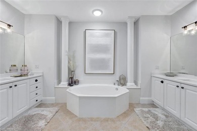 This unit is a must see! Stunning panoramic lake & golf course on The Rookery At Marco in Florida - for sale on GolfHomes.com, golf home, golf lot