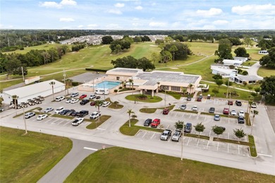 This cozy 2 bedroom 2 bath home is perfect for tranquil days and on Zellwood Station Country Club in Florida - for sale on GolfHomes.com, golf home, golf lot