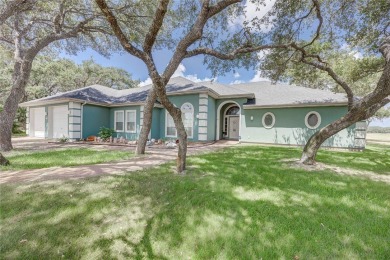 Welcome to 13th Fairway that hosts a beautifully appointed on Rockport Country Club in Texas - for sale on GolfHomes.com, golf home, golf lot