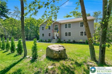 Welcome to this expansive 4-bedroom, 2.5-bath colonial offering on Pocono Farms Country Club in Pennsylvania - for sale on GolfHomes.com, golf home, golf lot
