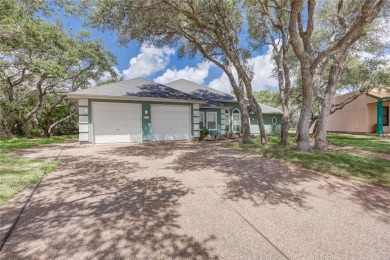 Welcome to 13th Fairway that hosts a beautifully appointed on Rockport Country Club in Texas - for sale on GolfHomes.com, golf home, golf lot