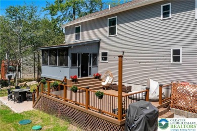 Welcome to this expansive 4-bedroom, 2.5-bath colonial offering on Pocono Farms Country Club in Pennsylvania - for sale on GolfHomes.com, golf home, golf lot