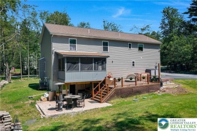 Welcome to this expansive 4-bedroom, 2.5-bath colonial offering on Pocono Farms Country Club in Pennsylvania - for sale on GolfHomes.com, golf home, golf lot