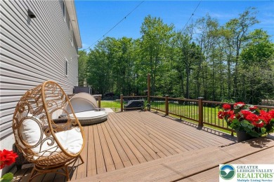 Welcome to this expansive 4-bedroom, 2.5-bath colonial offering on Pocono Farms Country Club in Pennsylvania - for sale on GolfHomes.com, golf home, golf lot