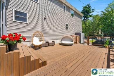 Welcome to this expansive 4-bedroom, 2.5-bath colonial offering on Pocono Farms Country Club in Pennsylvania - for sale on GolfHomes.com, golf home, golf lot