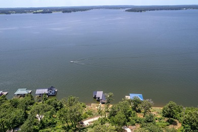 Introducing a RARE opportunity for luxury lakefront living and on Eagles Bluff Golf Course in Texas - for sale on GolfHomes.com, golf home, golf lot