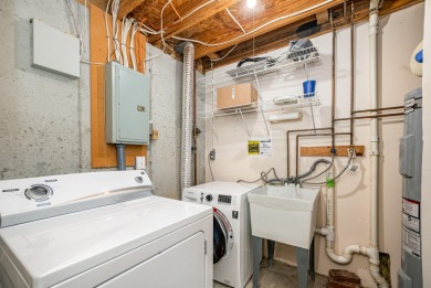This three-level floor plan townhouse features clean updates and on Boone Links Golf Course in Kentucky - for sale on GolfHomes.com, golf home, golf lot