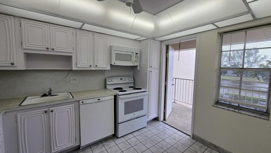 Great opportunity to own a spacious 2 bed, 2 bath condo in on Palm-Aire Country Club and Resort - Palms in Florida - for sale on GolfHomes.com, golf home, golf lot
