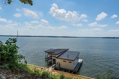 Introducing a RARE opportunity for luxury lakefront living and on Eagles Bluff Golf Course in Texas - for sale on GolfHomes.com, golf home, golf lot