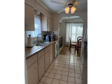 This great manufactured home on leased land is located in Lake on Pine Lakes Country Club in Florida - for sale on GolfHomes.com, golf home, golf lot