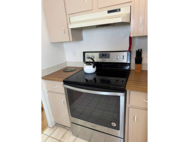 This great manufactured home on leased land is located in Lake on Pine Lakes Country Club in Florida - for sale on GolfHomes.com, golf home, golf lot