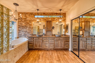 Welcome home to an exceptional 4-bedroom, 3-bath residence on Red Mountain Ranch Country Club in Arizona - for sale on GolfHomes.com, golf home, golf lot