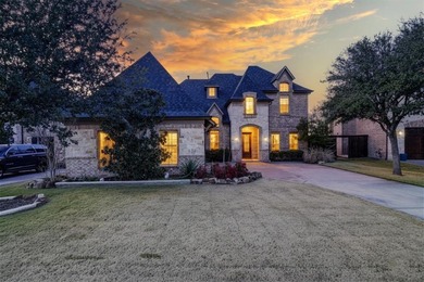Set on a premier golf course lot with breathtaking sunset views on The Trails of Frisco Golf Club in Texas - for sale on GolfHomes.com, golf home, golf lot