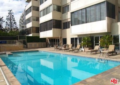 Elegant High-Rise Living at The Comstock, Set high on the 7th on Los Angeles Country Club in California - for sale on GolfHomes.com, golf home, golf lot