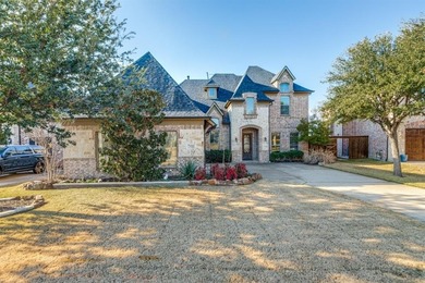 Set on a premier golf course lot with breathtaking sunset views on The Trails of Frisco Golf Club in Texas - for sale on GolfHomes.com, golf home, golf lot