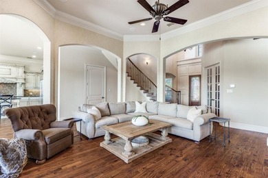 Set on a premier golf course lot with breathtaking sunset views on The Trails of Frisco Golf Club in Texas - for sale on GolfHomes.com, golf home, golf lot